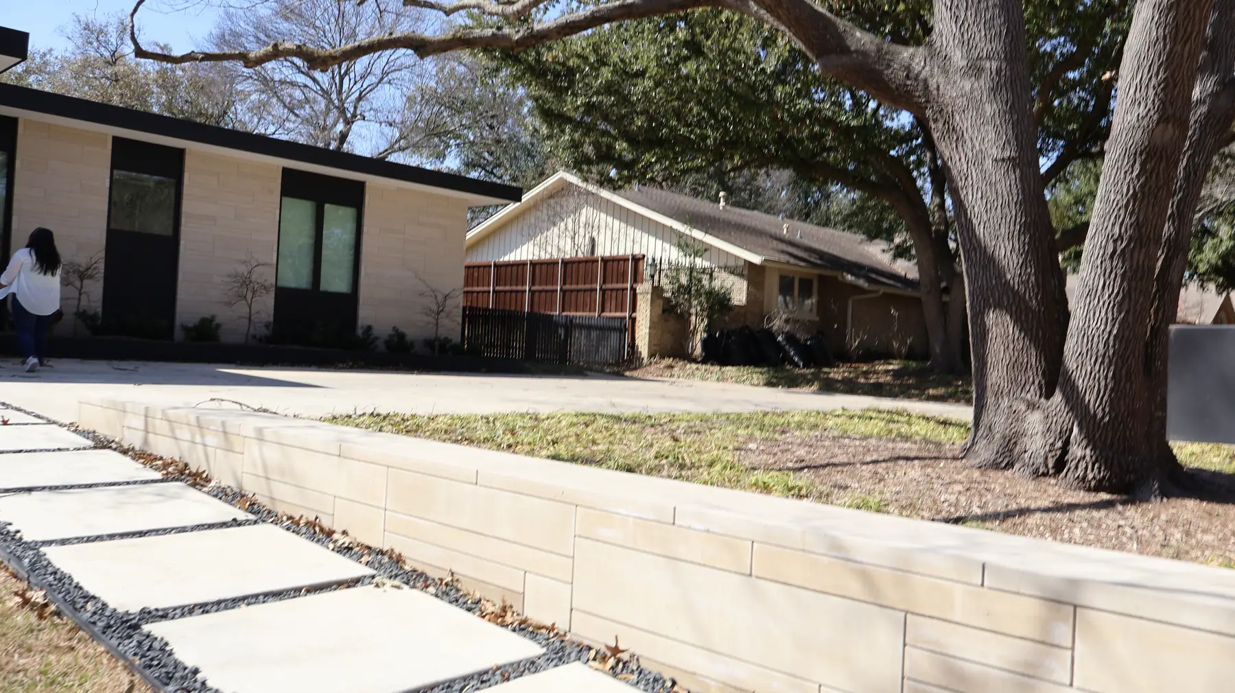 Limestone facade and garden wall on a modern Dallas home